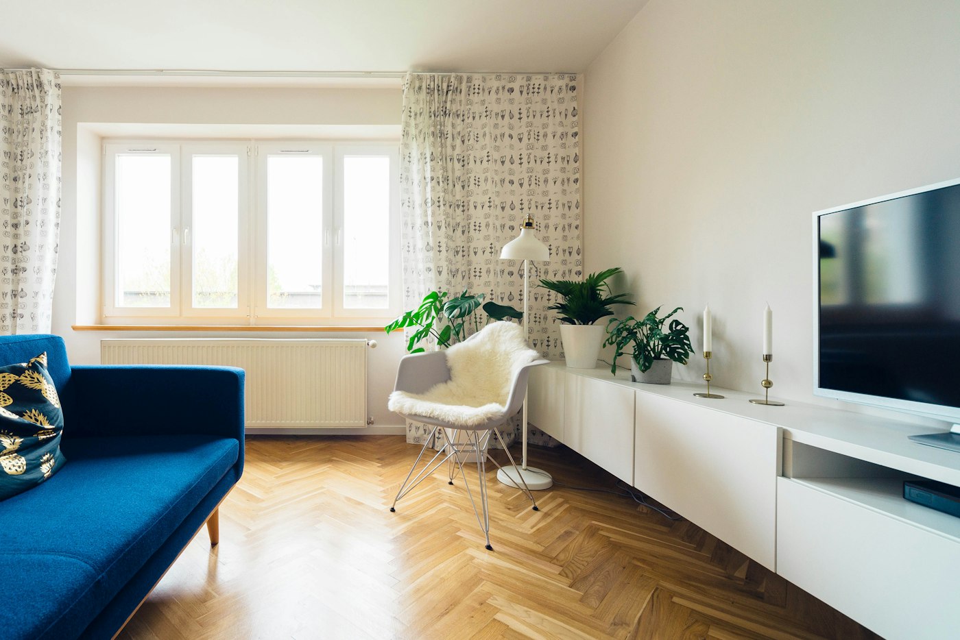 Sunlit living room with large replacement windows